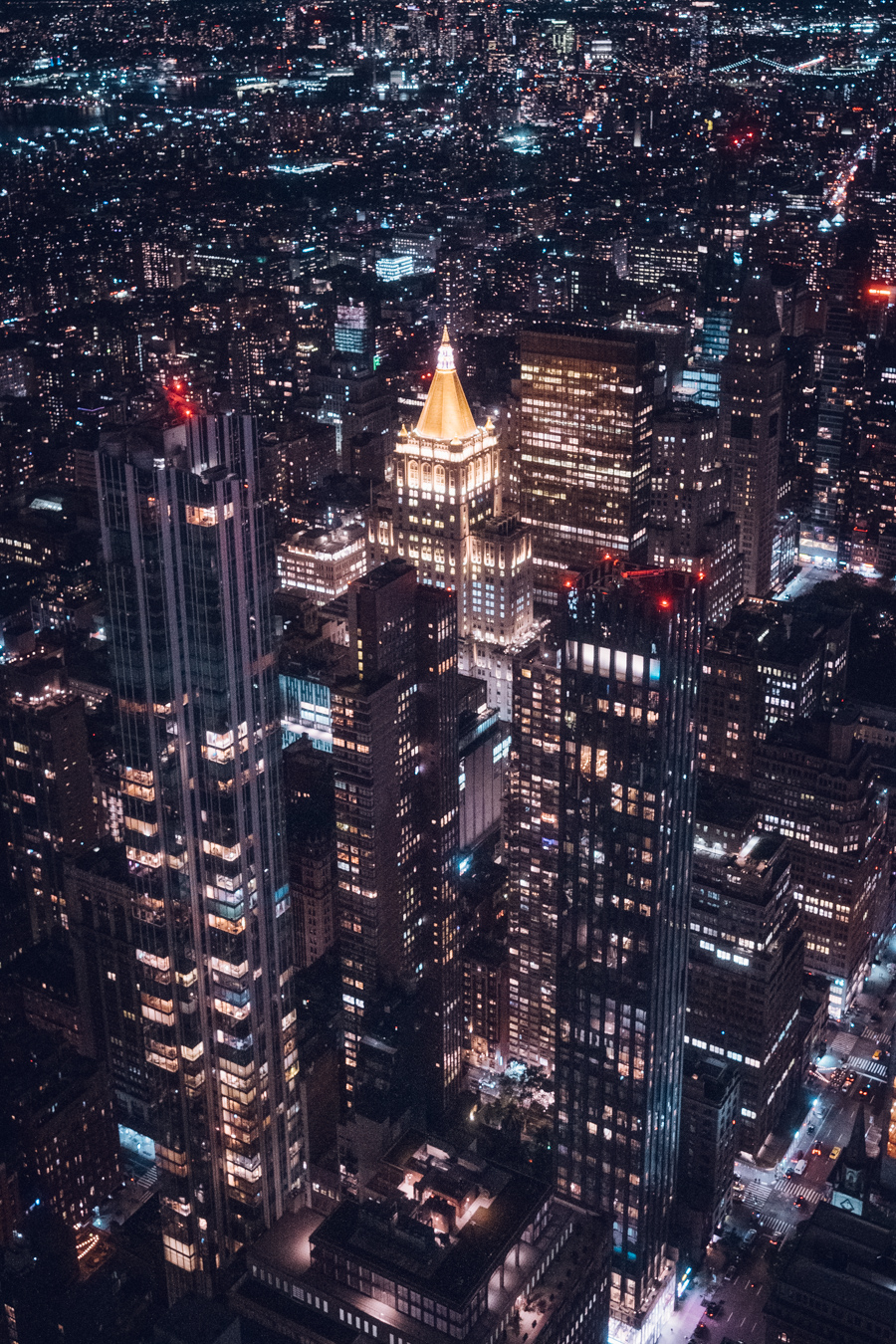Photograph of Manhattan by night, taken from the Empire State Building, New York by Alex Nichol